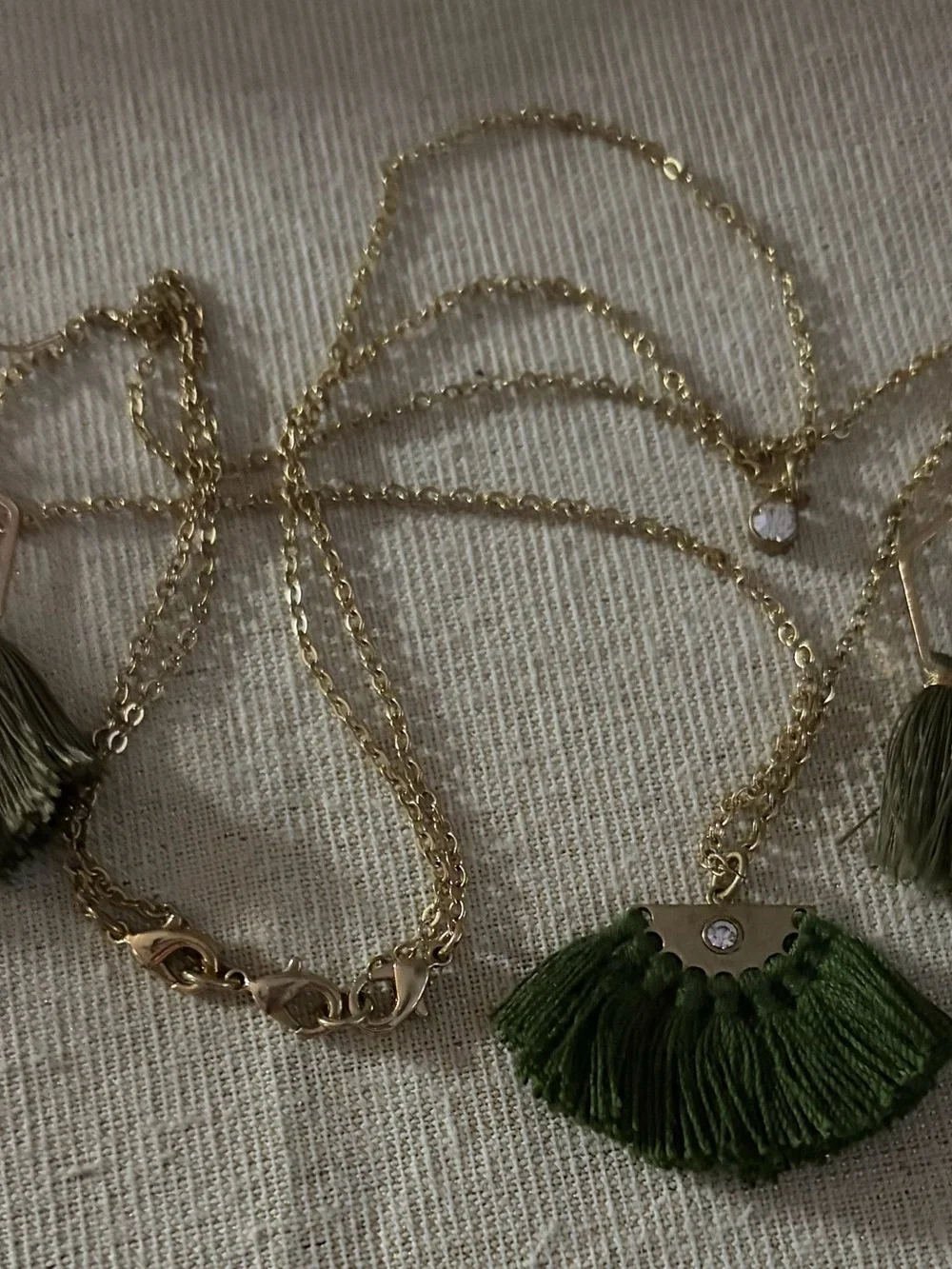 Layered Gold-Tone Necklace with Olive Tassel Accent and Matching Earrings